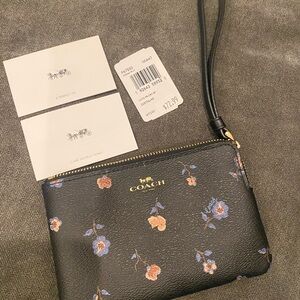 New Coach wristlet. Never used